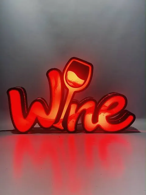 Red neon-style Wine sign with a wine glass detail