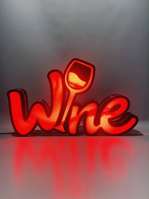 Red neon-style Wine sign with a wine glass detail